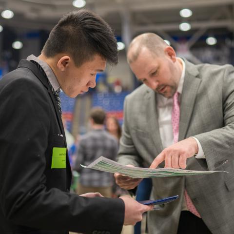 Student and employer at UNH Career Fair